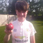 Wembdon U13s' Jack Dickinson with the match ball.