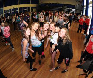 Young dancers from Bridgwater prepare for their performance with Alexandra Burke
