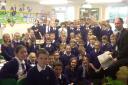 Year six pupils with Alex Cameron