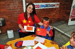 FYLING the flag: Languages day at Somerset Bridge Primary School, with Adrianne Gill and Jack, aged seven. 