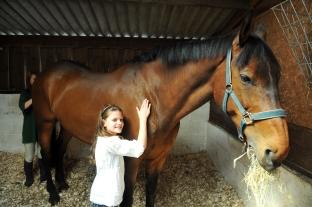 Open weekend at Bridgwater College's Cannington Centre.
Mary, aged nine, with Tom the horse.