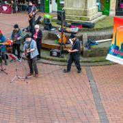 Guitarists gathered in the town centre for a flash-mob performance of Should I Stay or Should I Go? by The Clash.