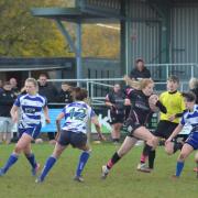 BREAK: North Petherton Ladies' two-try hero Stacey Saunders bursts through the Oakmeadians defence. Pic: Chris Hancock