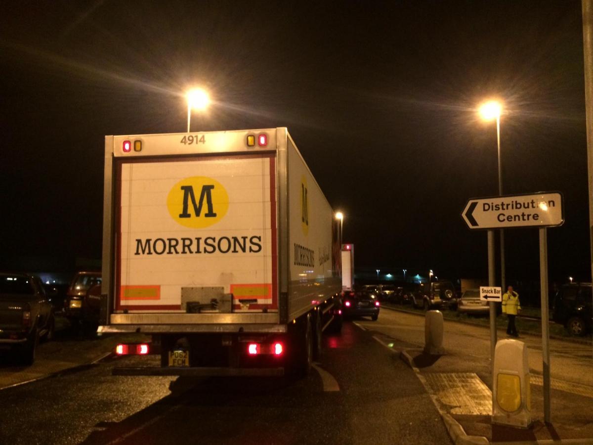 MORRISONS delivery lorries tailback for miles as farmers prevent them from accessing the depot.