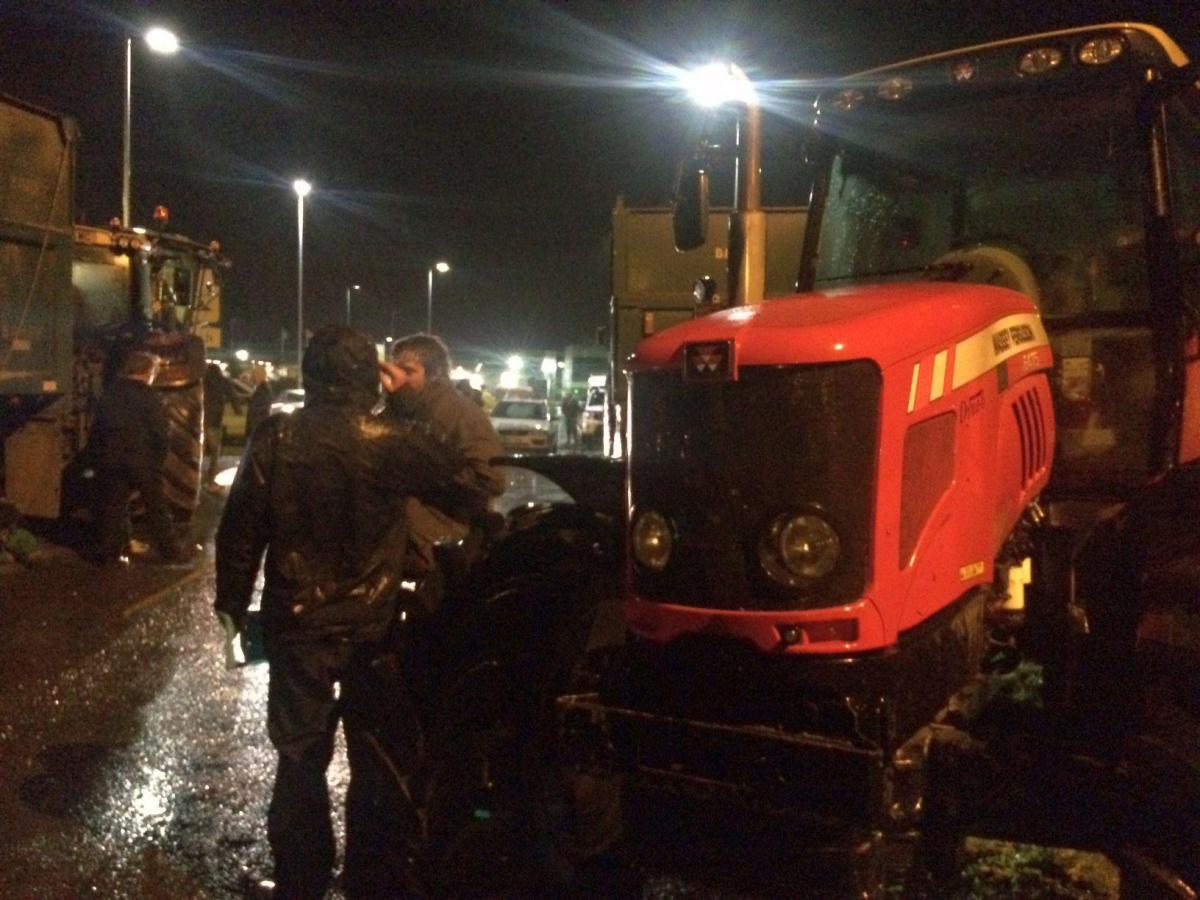 AROUND 50 tractors were parked at the entrance to the Morrisons distribution centre.