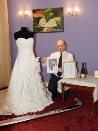 FUNERAL arranger Geoff Parker with the ration bride display at Co-operative Funeralcare in Bridgwater.