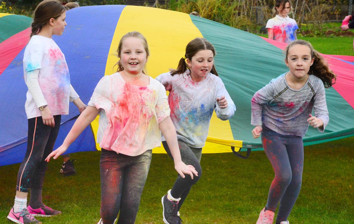 Dozens of pupils raised more than £3,000 with their 'colour run'