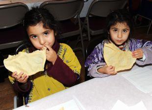 Ariana and Ayesha, both four, embraced Diwali at the Sydenham Community Centre.