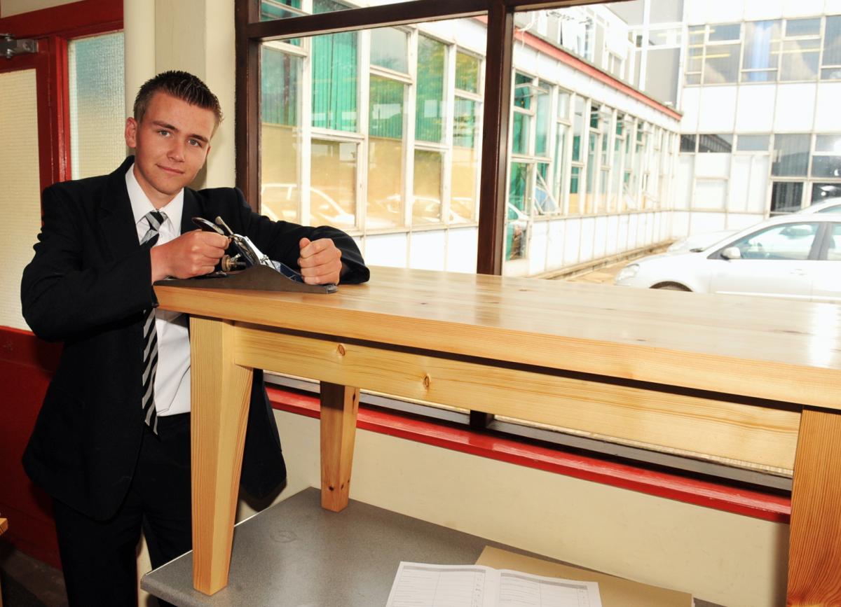 Charlie Gibbs proudly shows off his table.