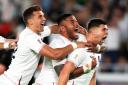 England's Ben Youngs (right) celebrates scoring a try with Henry Slade (left) and Manu Tuilagi but it is later ruled out following a TMO decision during the 2019 Rugby World Cup Semi Final match at International Stadium Yokohama. PA Photo. Picture