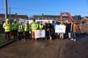 Representatives of Sedgemoor District Council, Homes In Sedgemoor and Rigg Construction at the Sydenham construction sites.