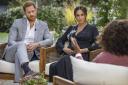 TORN APART: Prince Harry and Meghan, Duchess of Sussex, in conversation with Oprah Winfrey (pic: Joe Pugliese/Harpo Productions via AP)
