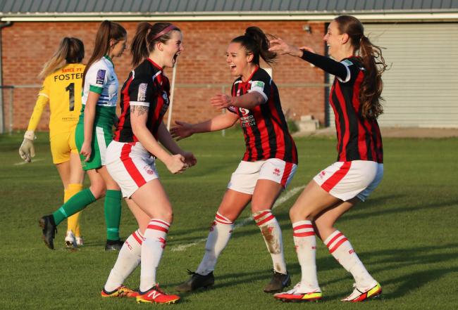 GOAL: Sydney Hinchcliffe, left, celebrates with her teammates (Photo: Craig Blake)