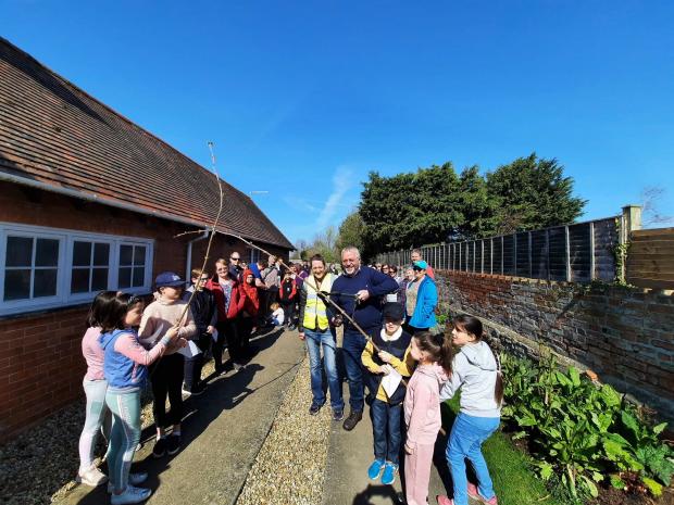 Bridgwater Mercury: Visitors and volunteers celebrate the opening of the village's new nature walk. Picture: Chedzoy Fair Share Project