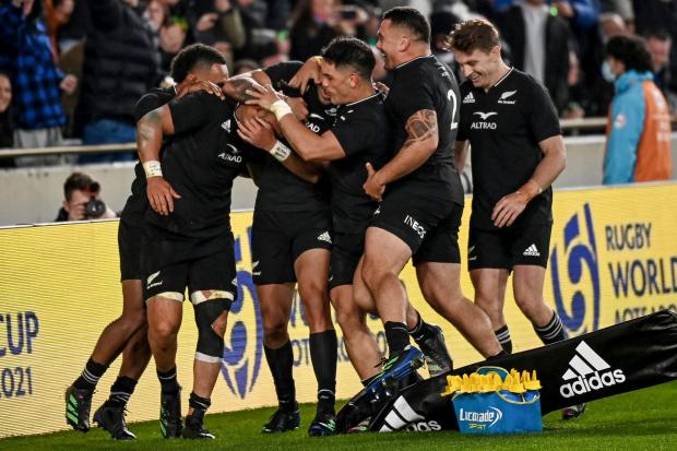 Ardie Savea, second left, celebrates one of his two tries against Ireland