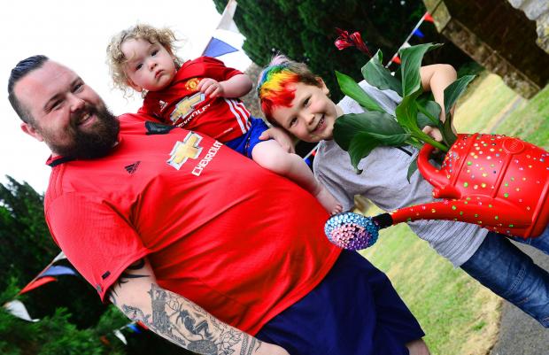 Bridgwater Mercury: Martyn, Odin and Logan Davey arrive at the flower show.