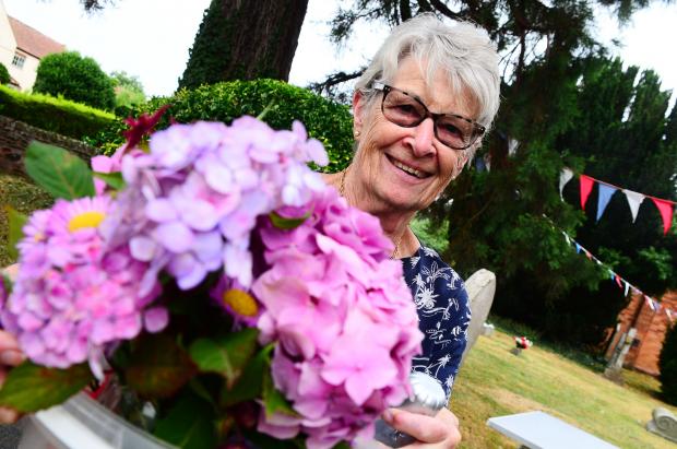 Bridgwater Mercury: Janet Bradford brings her flowers into the church.