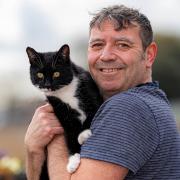 Gavin Dalley from Bridgwater with his pet cat Elsa, who is a finalist in the Social Star category of this year's Cats Protection National Cat Awards.