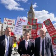 The SOS Levels group attended a protest outside the Houses of Parliament.